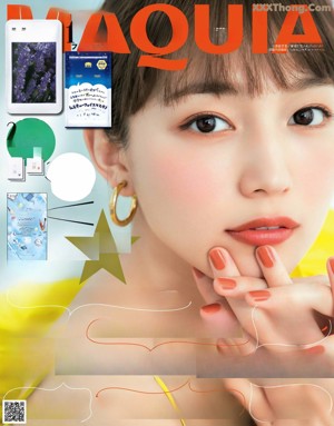 A magazine page with a picture of a woman's face and makeup.