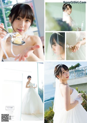 A woman in a black lingerie laying on a bed.