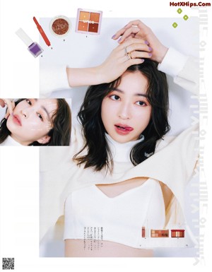 A magazine page with a picture of a woman's face.